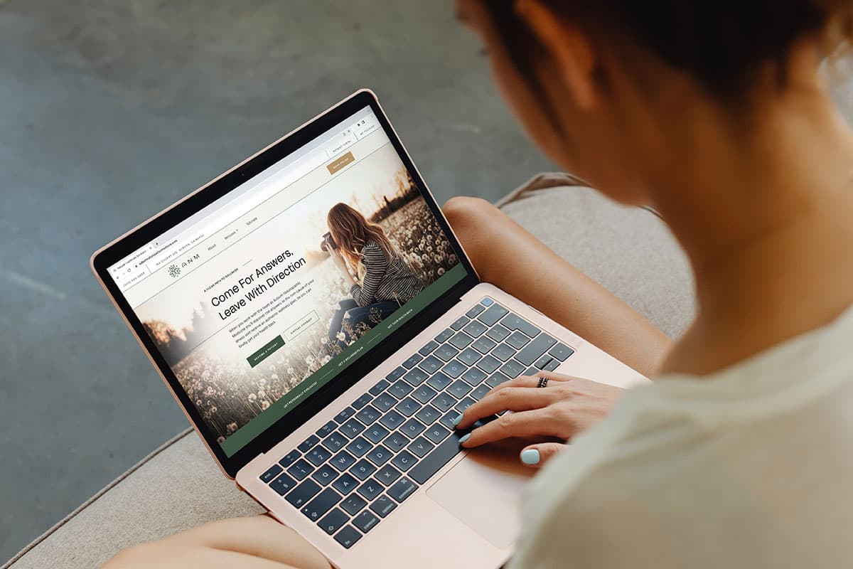 ANM website on a laptop