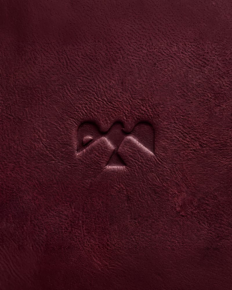 Burnt Fork Ranch mark embossed in leather