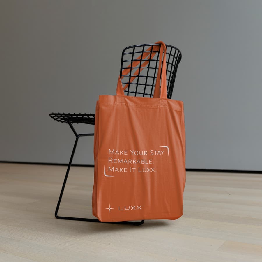 Luxx tote bag on a wire chair
