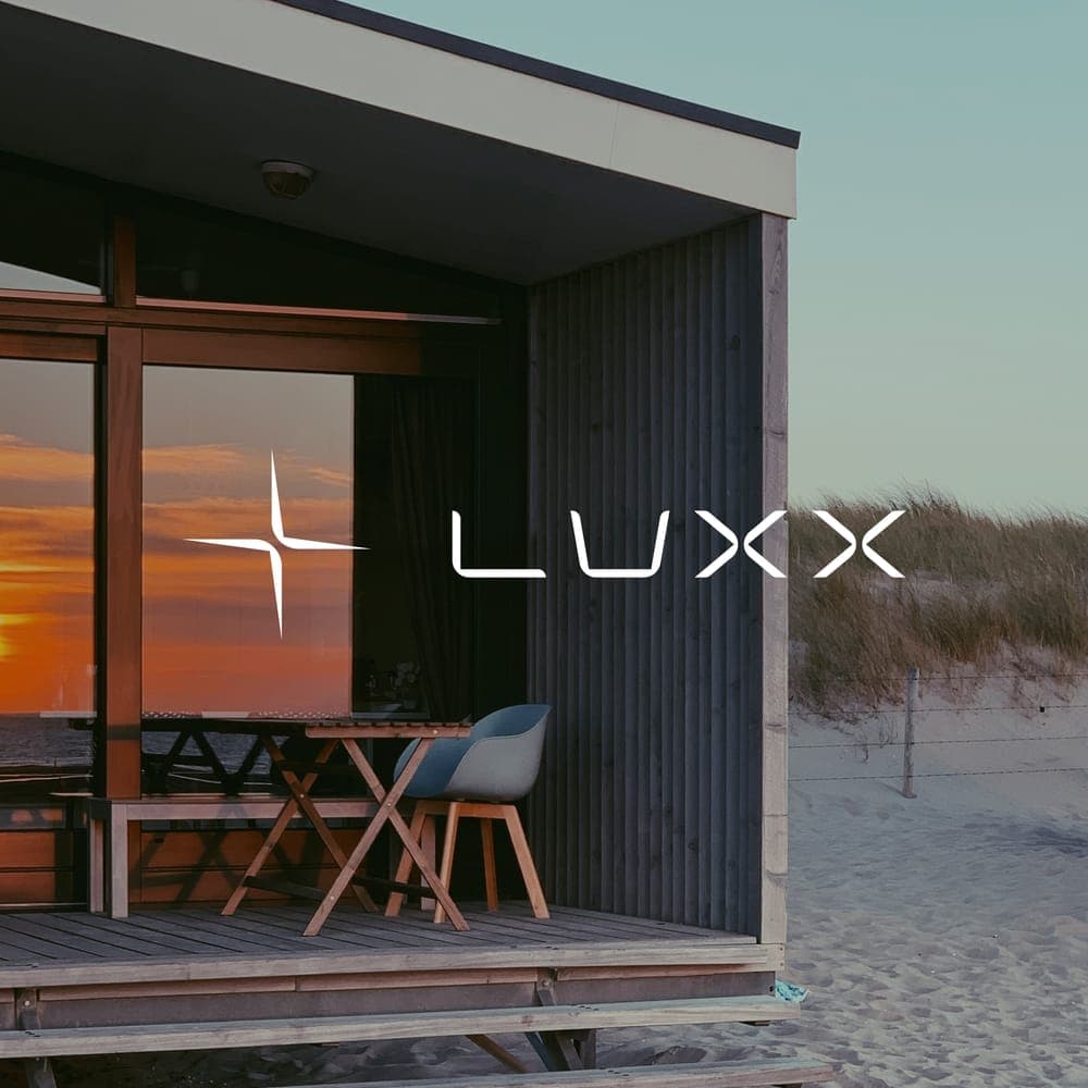 Luxx sign on a beach cabin